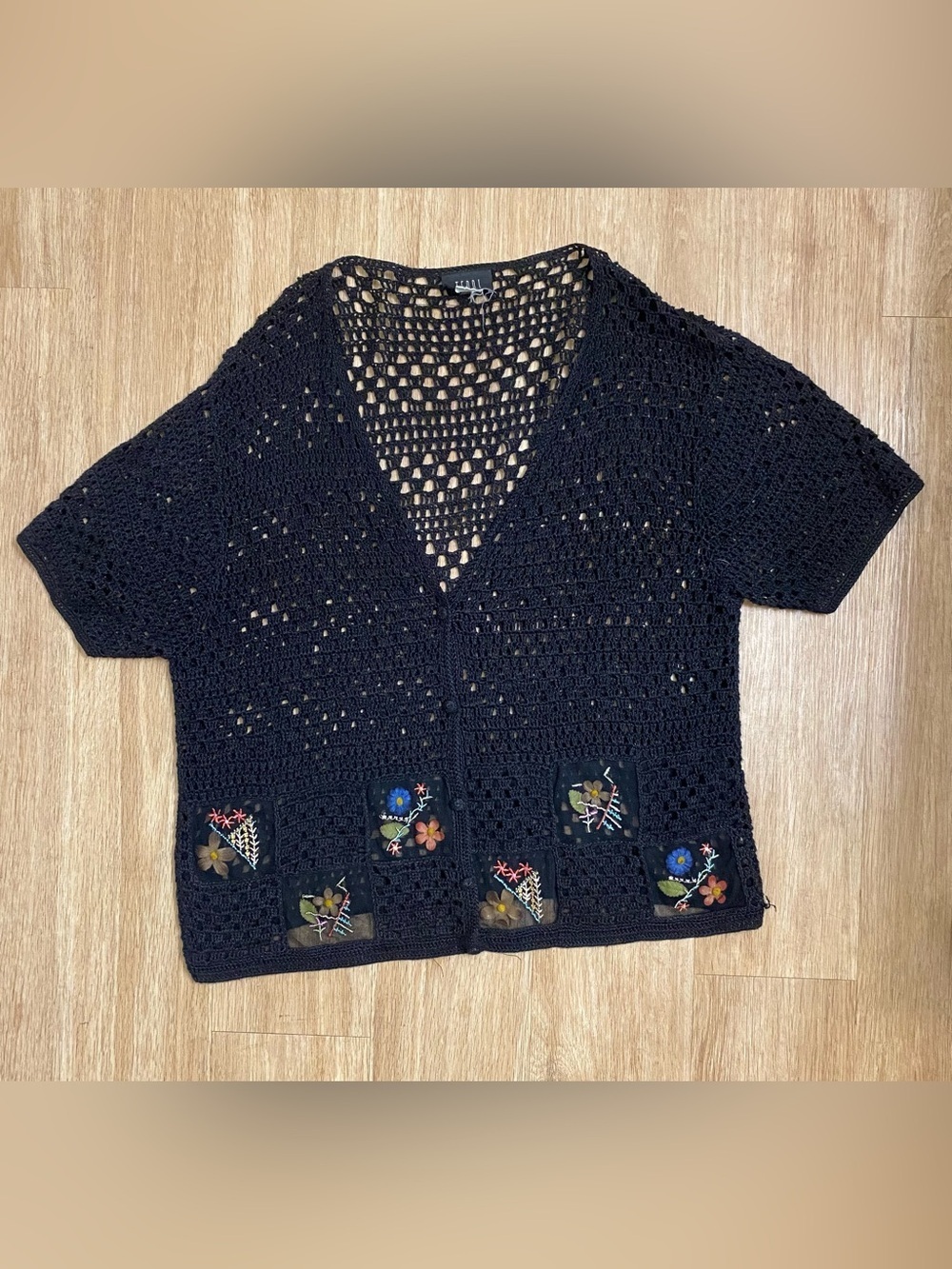 Teddi Black Crocheted V-Neck Sweater with Multicolor Floral Appliqués
